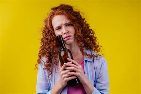 Curly Redhead Ginger Woman Drinking Beer And Feeling Bad Mood In Csudio