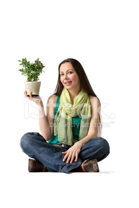 People Woman With Plant Stock Photo Royalty Free Freeimages