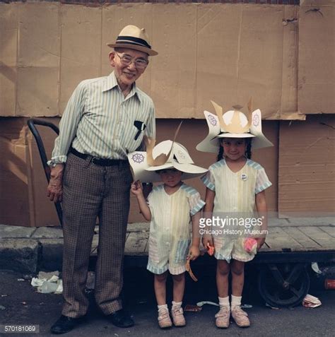 A Japanese Grandfather And His Two Granddaughters Wearing Paper Granddaughter How To Wear