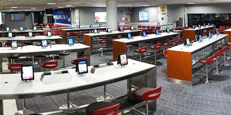 Ipad Stations In The Airport Terminal Library Signage Library Design