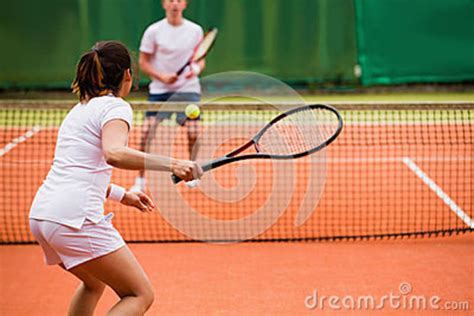 Tennis Players Playing A Match On The Court Stock Photo Image Of