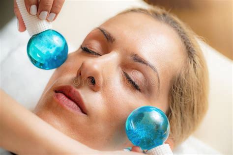 Face Massage With Ice Crystal Balls Stock Photo Image Of Equipment People