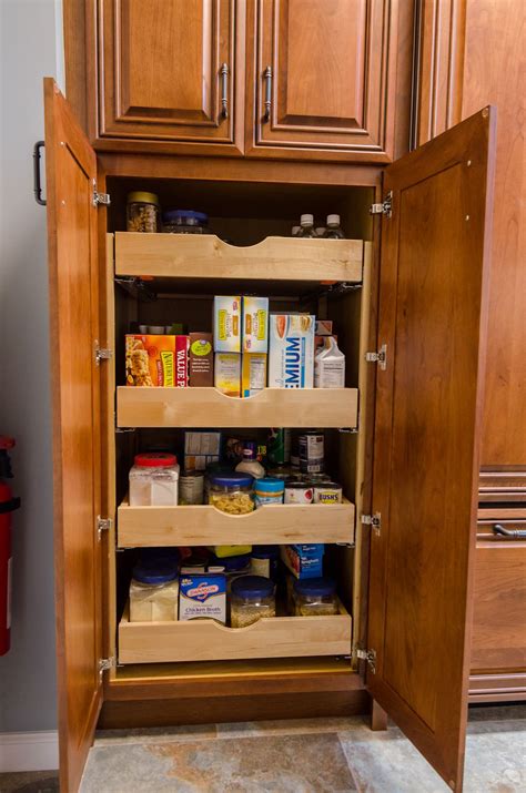 Available in a variety of finishes, home styles pantries are a great solution for adding storage to the kitchen or dining area. built in pantry | Built in pantry, Tall cabinet storage ...