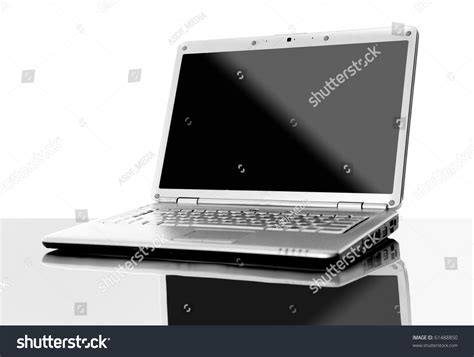Modern Laptop Isolated On White With Reflections On Glass Table Stock