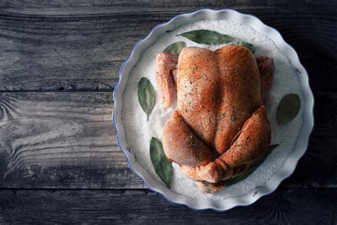 Make dishes that are familiar and comforting. Raw Thanksgiving Day Turkey With Spices On The Baking Dish With Salt And Bay Leaf Vertical Stock ...