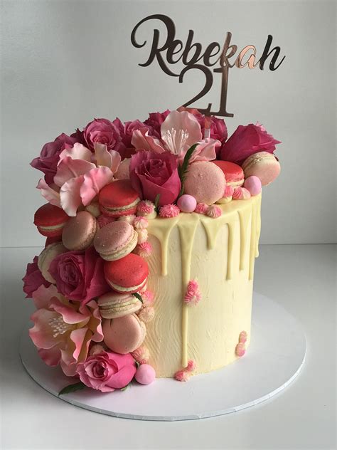 And today i will be talking to you about cake decorating. Fresh and fantasy flowers with macaroons on a drip cake ...