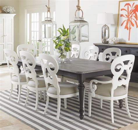 A traditional dining table set inspired by the farmhouse antique furniture look. Coastal Living Retreat 9-Piece Rectangular Leg Table Set ...