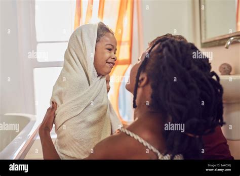 Happy Mother Drying Babe Off With Towel After Bath Stock Photo Alamy