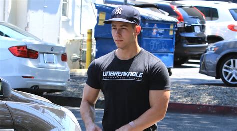 nick jonas shows off his buff arm muscles after a workout nick jonas just jared