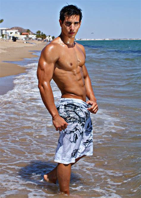 Flipflops And Boardies Hunk On The Beach