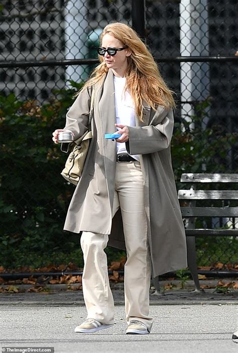 Jennifer Lawrence Puts On A Stylish Display In A Gray Trench Coat And