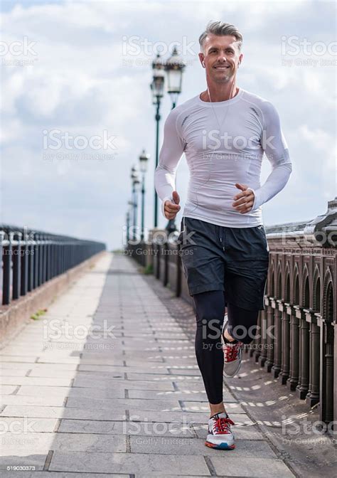 Man Running Outdoors Stock Photo Download Image Now Istock