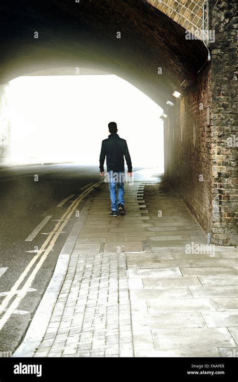 Man Walking Through Tunnel Hi Res Stock Photography And Images Alamy