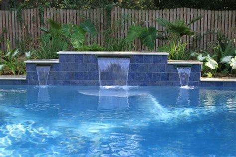 Swimming pool water feature variations are endless. Swimming Pool with Water Features Located in Mt. Pleasant ...