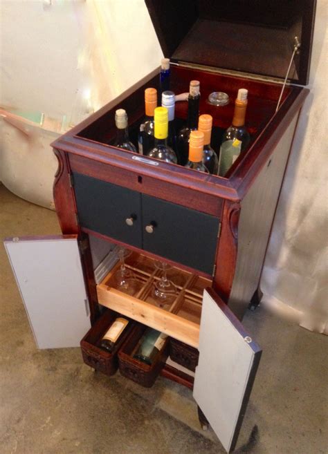 Wine And Liquor Cabinet Created From A Vintage Victrola Case Bottles On