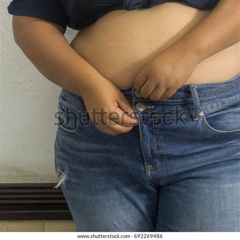 Overweight Woman Trying Fasten Her Blue Stock Photo