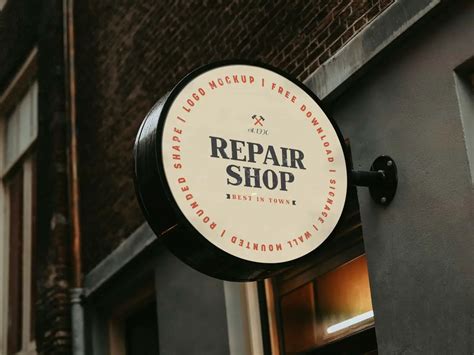 Perspective View Of A Vintage Round Shop Signage Mockup Free