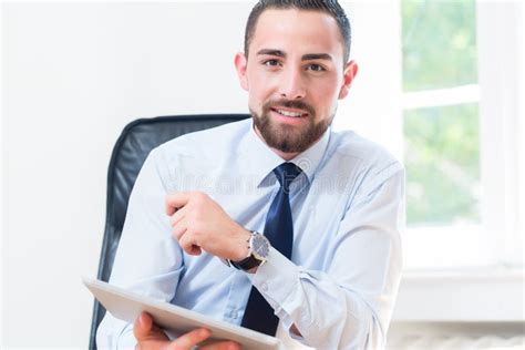 Businessman In Office With Tablet Computer Stock Photo Image Of