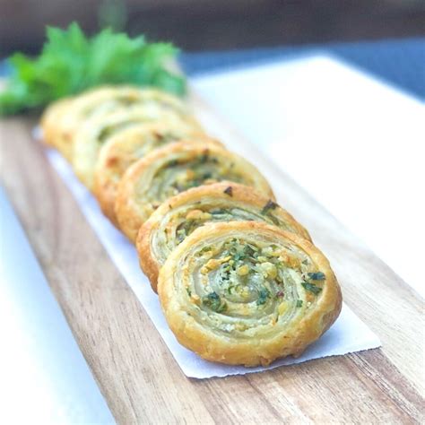 easy and delicious puff pastry garlic n herb pinwheels recipe