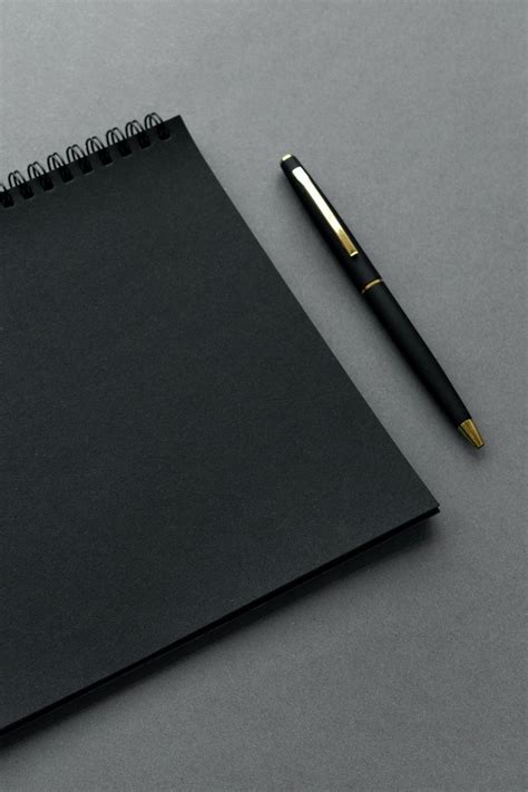 Download Premium Image Of Black Notebook With A Pen By Ake About