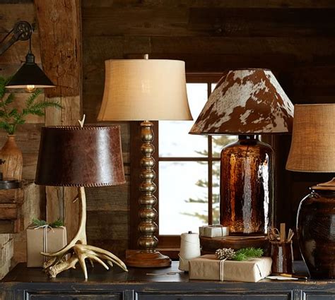 Finished in antique bronze and brass, the base of our lamp is beautifully topped. PB Basic Cowhide Lamp Shade | Pottery Barn