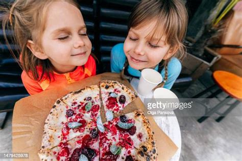 Kid Smelling Food Photos And Premium High Res Pictures Getty Images