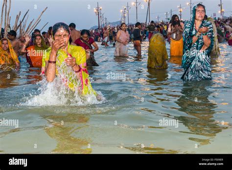 People Taking Bath Early Morning At The Sangam The Confluence Of The