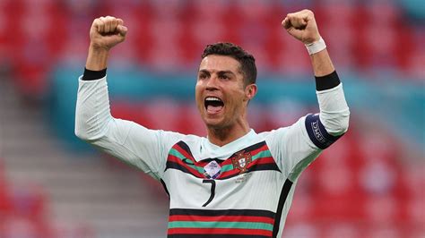 Cristiano Ronaldo Cr7 Is Wearing White Sports Dress In Colorful Blur