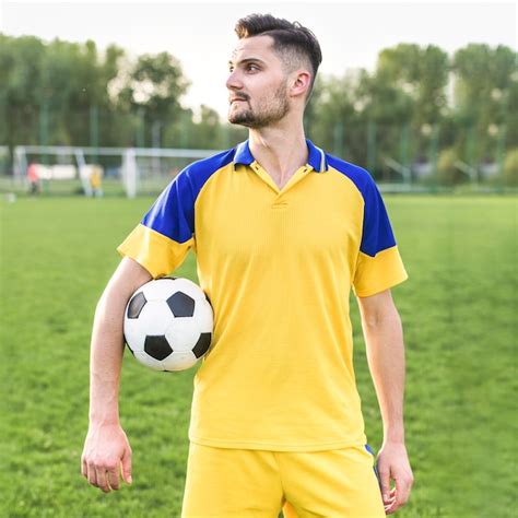 Free Photo Amateur Football Concept With Man Posing With Ball