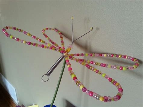 Garden Dragonfly Out Of A Wire Whisk Garden Crafts Diy Wire Crafts