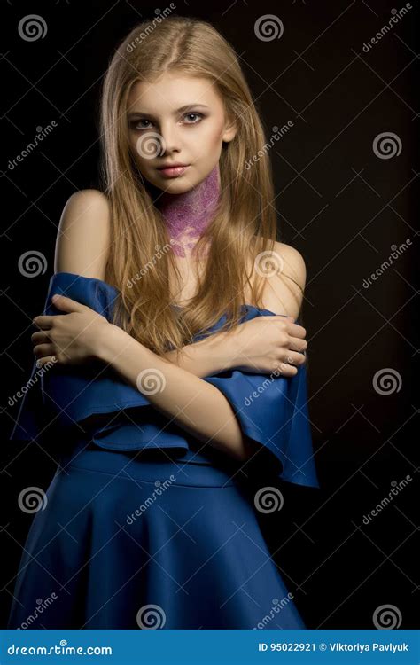 Attractive Blonde Woman With Creative Makeup And Dress With Naked Shoulders Stock Image Image