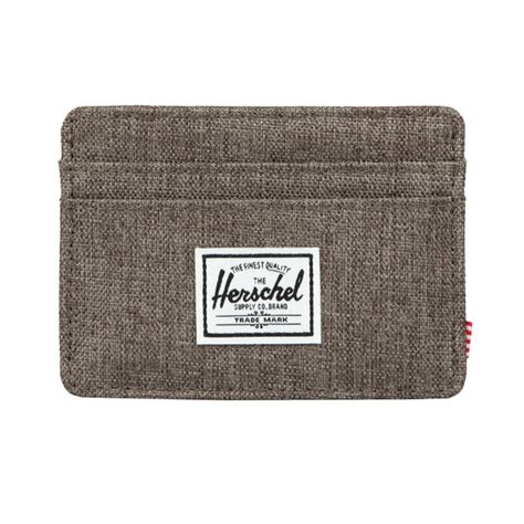 The company was founded by lyndon and jamie corma. Herschel Charlie Card Holder | Oxygen Clothing
