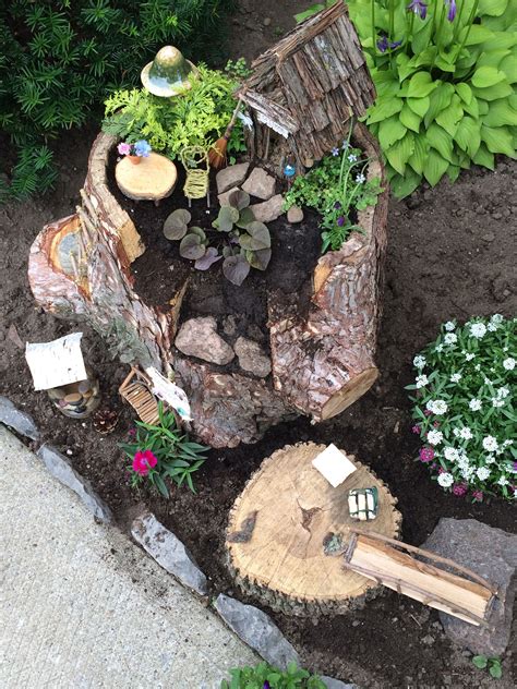 Miniature Fairy Garden In A Hollowed Out Tree Stump Miniature Fairy