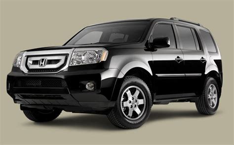 The Front End Of A Black Honda Pilot Suv Parked On A Gray Background