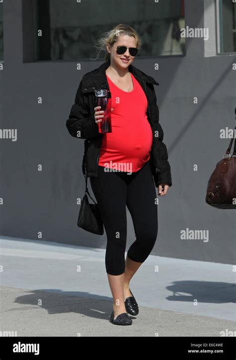Heavily Pregnant Teresa Palmer Leaving A Gym In West Hollywood Wearing A Bright Red Cropped Top
