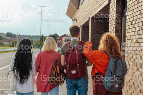 Students Leaving University After Classes Stock Photo Download Image
