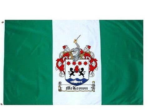 Crest—an arm embowed in chain armour, the hand holding a sword, blade wavy all ppr. Mckeown Coat of Arms Flag / Family Crest Flag - Coat of Arms