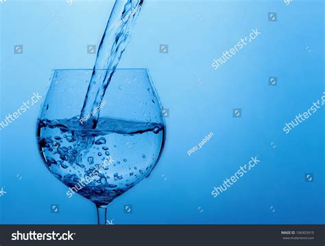 Pouring Water Into Glass Stock Photo 106903910 Shutterstock