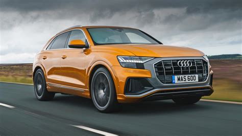 The sporty interior conveys luxurious charm; Audi Q8 Price, Running Costs & MPG | Top Gear