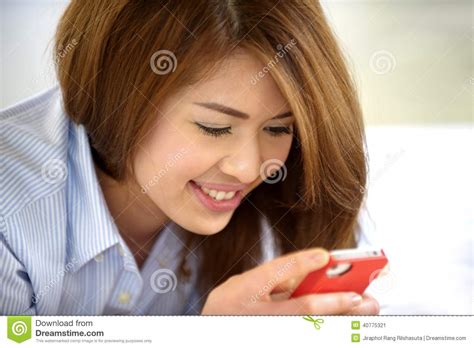 Beautiful Thai Teen Laughing With Mobile Phone Stock Image Image Of