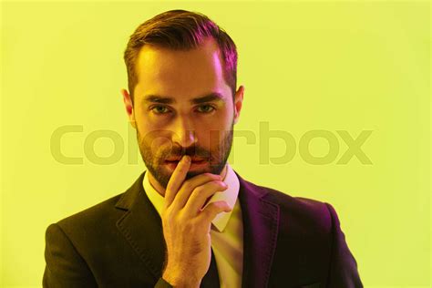 Image Of Brooding Unshaven Businessman In Formal Suit Holding Hand At