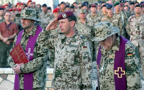 German Military Chaplains During A Funeral Service At Isaf Military