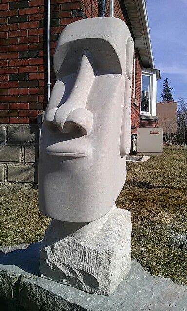 A highly detailed solid stone cast garden ornament of two easter island heads leaning to each other. Easter Island head | Easter island statues, Tiki statues ...