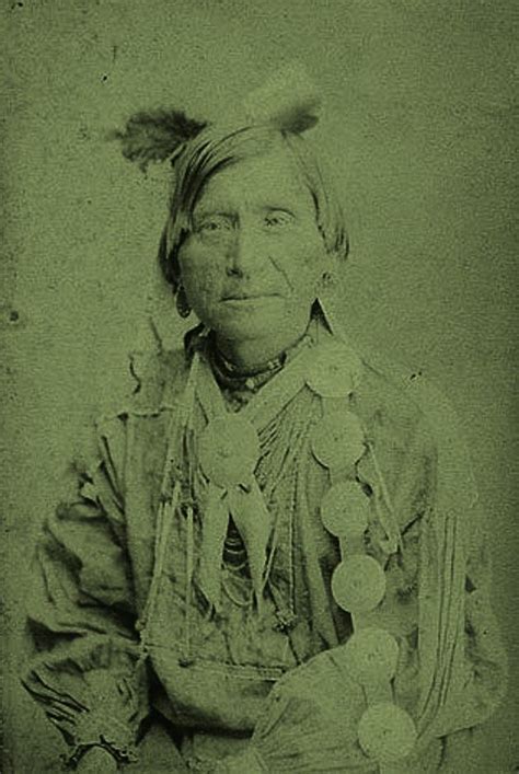 An Old Photo Of A Native American Man