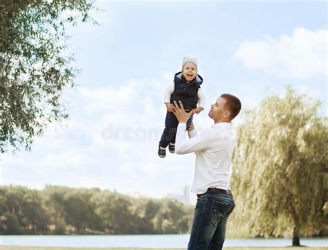 Happy Father And Son On A Walk On A Sunny Day Stock Photo Image Of