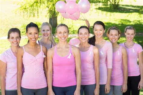 Smiling Women In Pink For Breast Cancer Awareness Stock Photo By