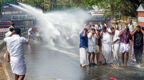 WATCH Tear Gas Water Cannons As Cong Workers Cops Clash Over Kerala