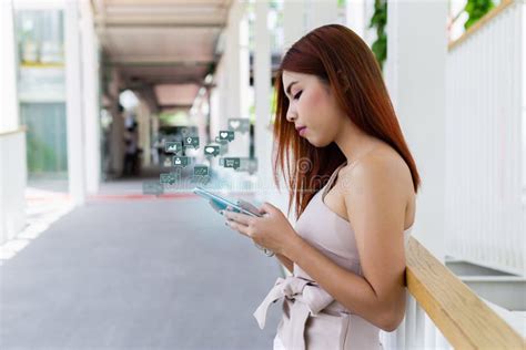 Successful Beautiful Businesswoman Holding Smartphone With Notification