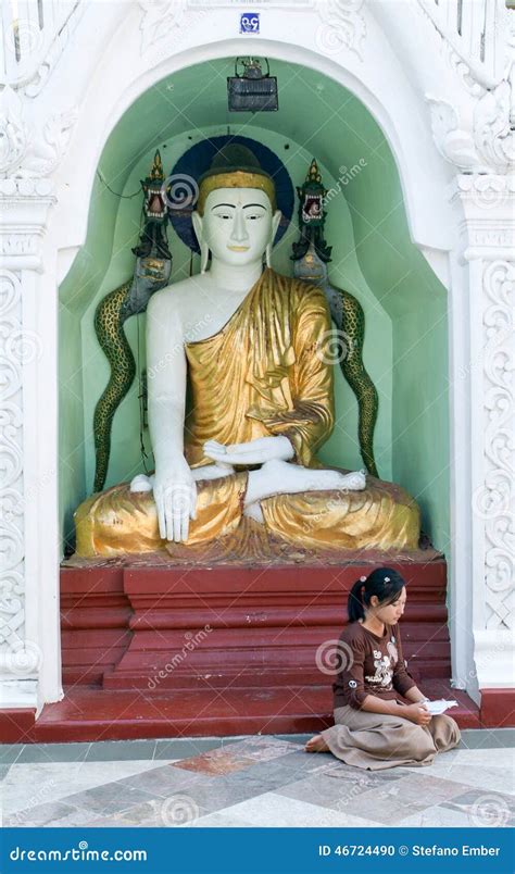 Woman Praying On The Area Of The Shwedagon Pagoda In Yangon Editorial