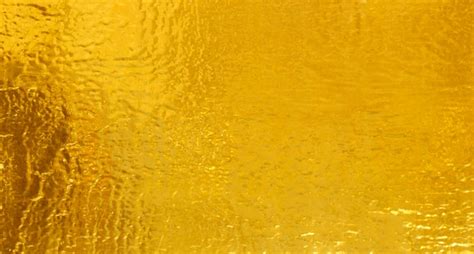 Premium Photo Shiny Yellow Leaf Gold Foil Texture Background